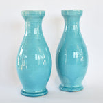 Turquoise bottle-shaped pillar candleholders